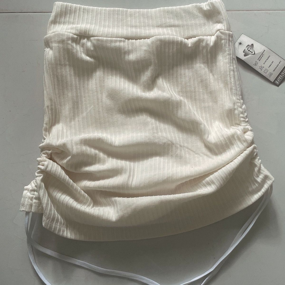 CHÂN VÁY RÚT DÂY CÓ QUẦN BÊN TRONG - NHƯ Ý BOUTIQUE CHÂN VÁY RÚT DÂY CÓ QUẦN BÊN TRONG - NHƯ Ý BOUTIQUE