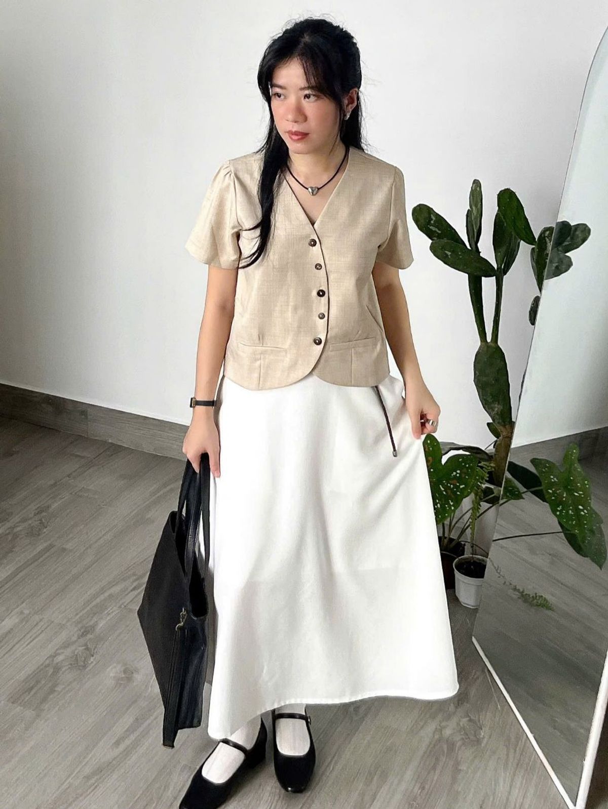 Áo lửng fom suông tay ngắn nút gỗ Áo lửng fom suông tay ngắn nút gỗ