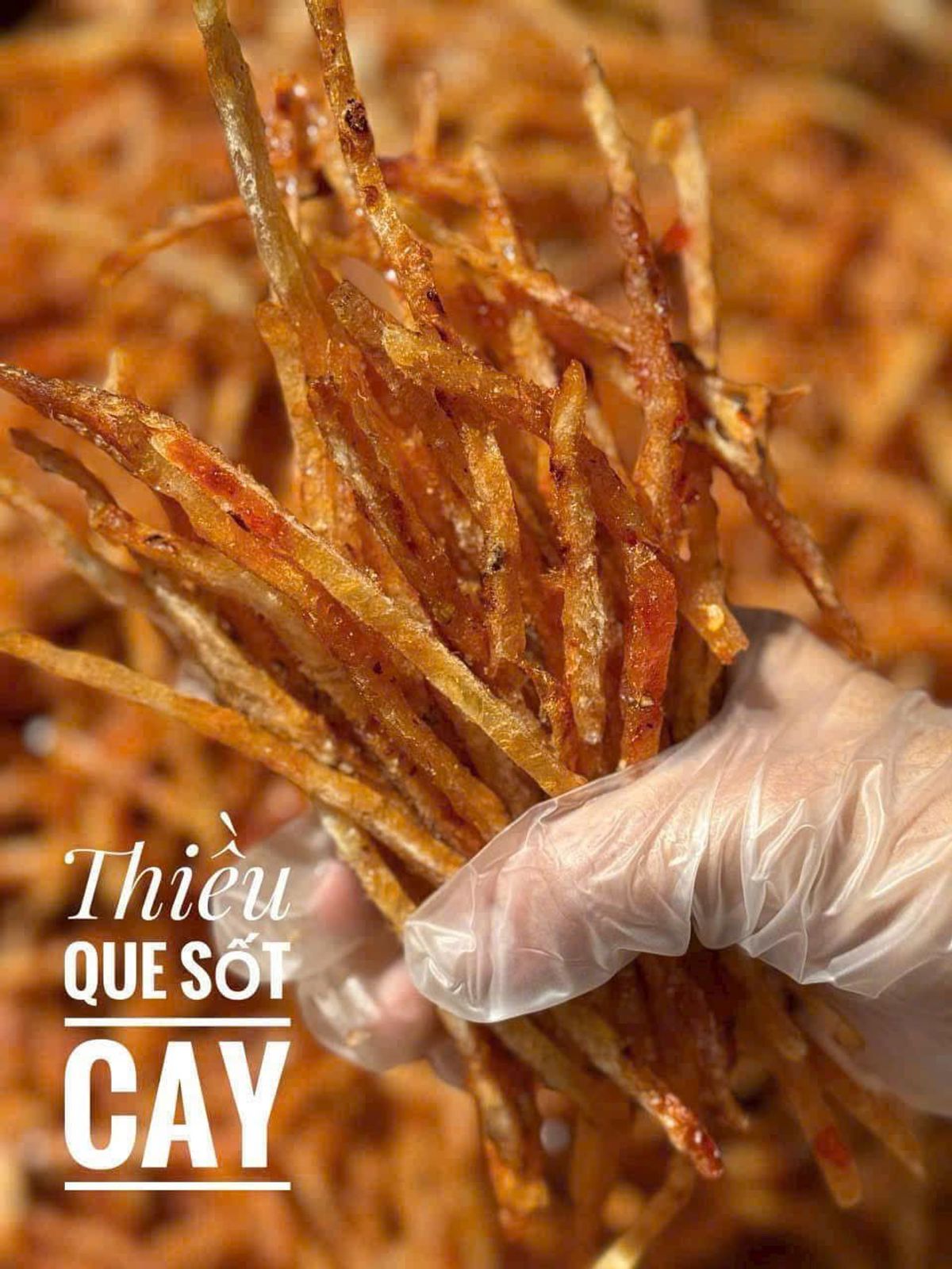 CÁ THIỀU QUE SỐT CAY: MÓN ĂN VẶT LÝ TƯỞNG - NHÂM NHI CÁ THIỀU QUE SỐT CAY: MÓN ĂN VẶT LÝ TƯỞNG - NHÂM NHI