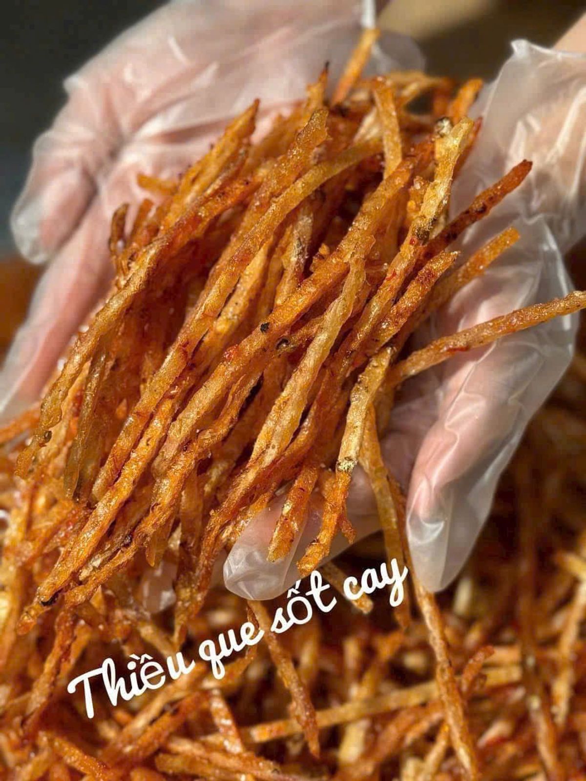 CÁ THIỀU QUE SỐT CAY: MÓN ĂN VẶT LÝ TƯỞNG - NHÂM NHI CÁ THIỀU QUE SỐT CAY: MÓN ĂN VẶT LÝ TƯỞNG - NHÂM NHI