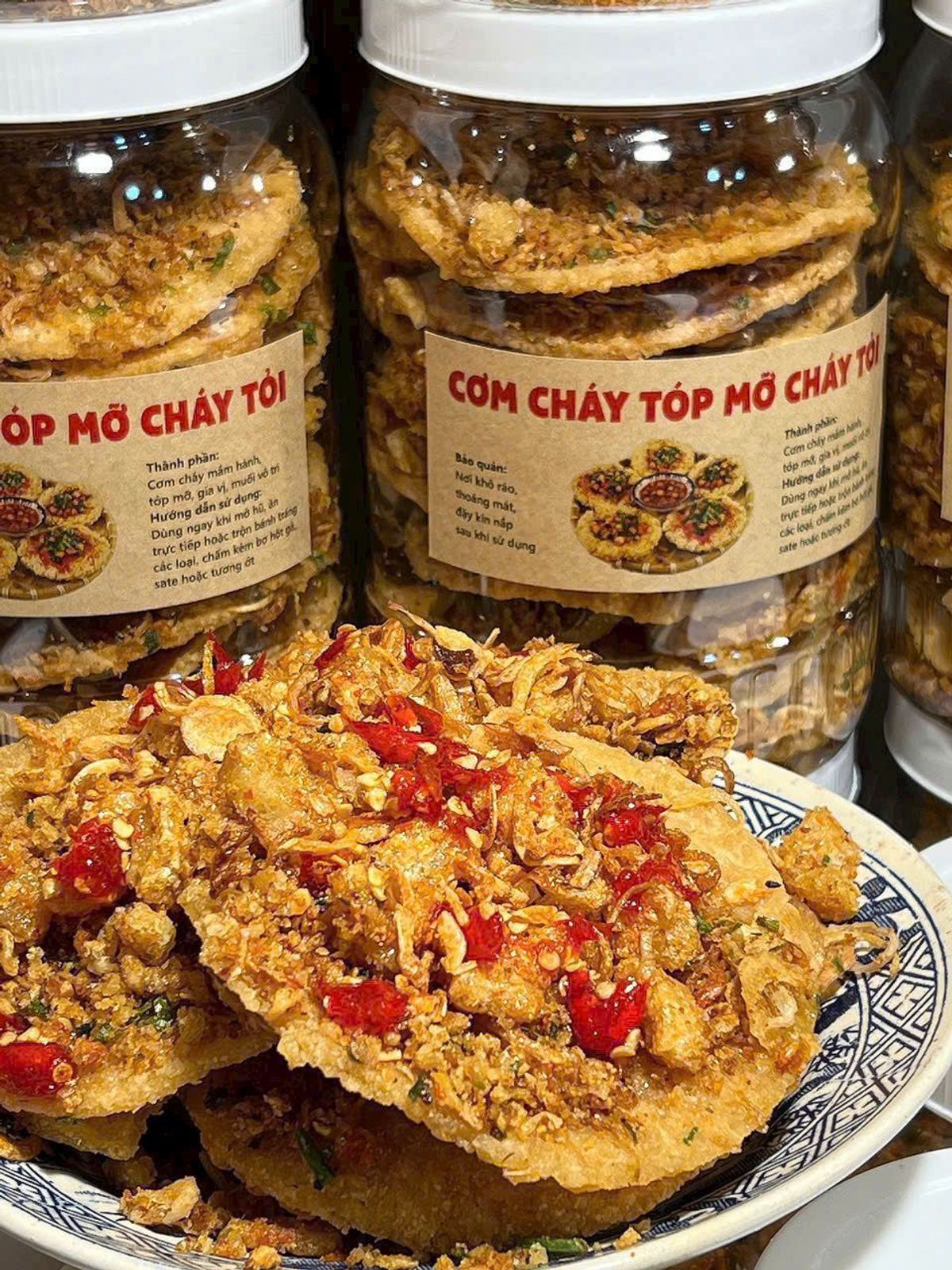 CƠM CHÁY TÓP MỠ HÀNH PHI MUỐI TÔM, HƯƠNG VỊ ĐẶC BIỆT 500G - WINNIE HOUSE CƠM CHÁY TÓP MỠ HÀNH PHI MUỐI TÔM, HƯƠNG VỊ ĐẶC BIỆT 500G - WINNIE HOUSE