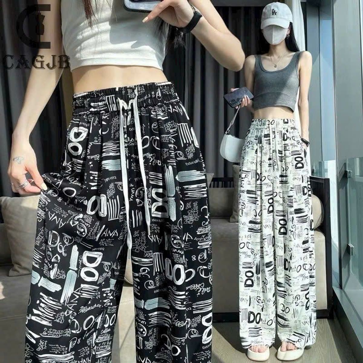 Quần suông lụa in hoạ tiết ống rộng cạp chun thời trang Quần suông lụa in hoạ tiết ống rộng cạp chun thời trang