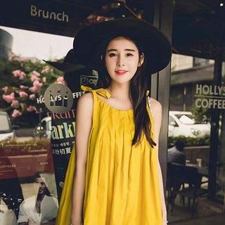 Đầm suông sếp li cột nơ vai