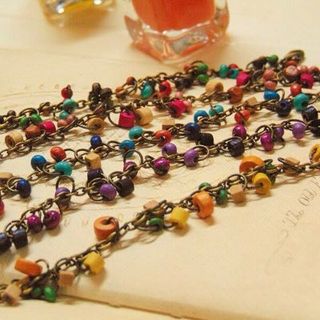 Lắc chân gỗ đồng