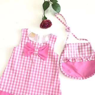 Đầm caro 1 nơ túi 544000₫