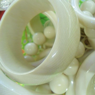 Còng nhẫn ngà vân kín