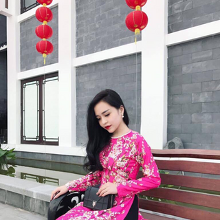 áo dài gấm hoa đào kết hạt