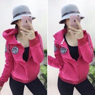 Áo khoác ka ki nữ màu xanh lá có hình tròn ở cánh tay
