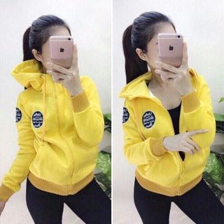 Áo khoác ka ki nữ màu xanh lá có hình tròn ở cánh tay