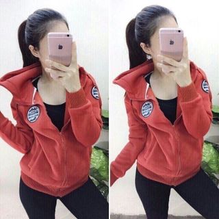 Áo khoác ka ki nữ màu xanh lá có hình tròn ở cánh tay