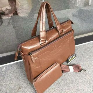 cặp da công sở và laptop