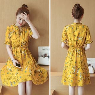 Đầm xòe nơ cổ hoa lá June