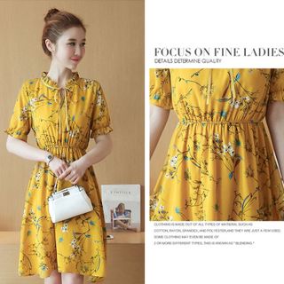 Đầm xòe nơ cổ hoa lá June
