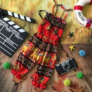 Jumpsuit lanh sành điệu bé gái