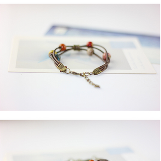 Vòng tay handmade gốm thỏ chiếc lá