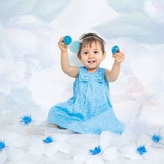 Đầm xếp ly đính nơ