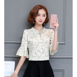 Áo sơ mi hoa kem cổ nhún cột nơ tay loe
