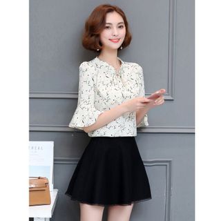 Áo sơ mi hoa kem cổ nhún cột nơ tay loe