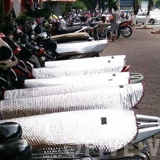 bạc chống nóng yên xe