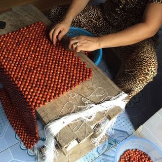 lót ghế xe hơi hạt gỗ