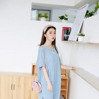 đầm xanh cổ V