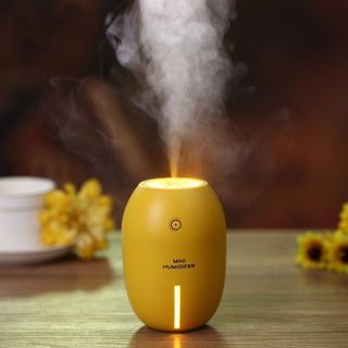 Máy phun sương mini hình quả chanh tích hợp đèn ngủ - phunsuonglemon giá sỉ