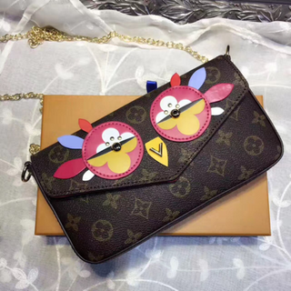 túi đeo chéo cầm tay mắt cú