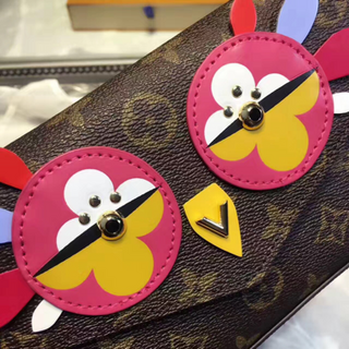 túi đeo chéo cầm tay mắt cú