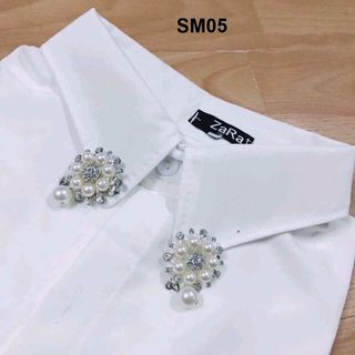 Áo sơ mi nữ kèm hoa cài
