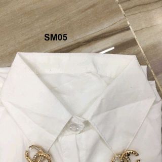 Áo sơ mi nữ kèm hoa cài