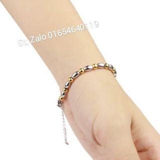 Lắc tay ovan trắng vàng