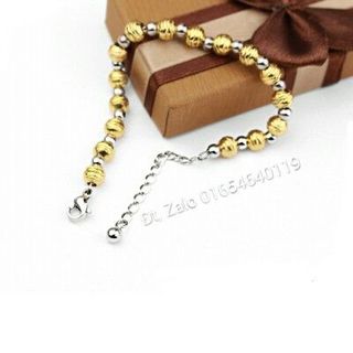 Lắc tay bi trắng vàng