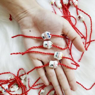 vòng tay mèo sứ