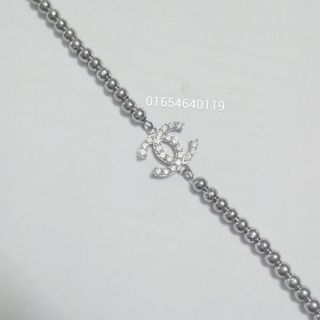 Lắc tay bi mặt cha-nel đính xoàn
