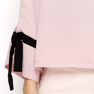 Áo nữ thời trang tay loe cột nơ điệu đà màu hồng