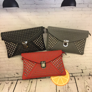 Ví cầm Clutch khoá sập nạm đinh