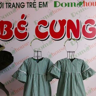 Đầm bé gái viền ren tay loe