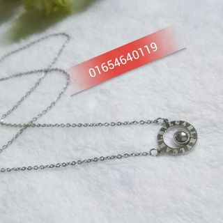 Dây chuyền inox hình tròn gắn bi khắc chữ La Mã