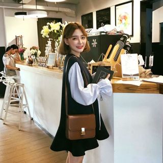 đầm phối tay sọc