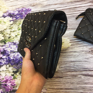 Ví cầm tay Clutch x đinh