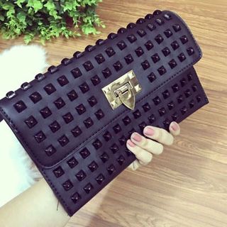 ví cầm tay tán đinh