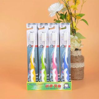 Bàn chải đánh răng EQ trắng