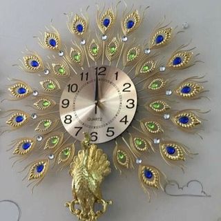 đồng hồ pha lê / đồng hồ trang trí con công đồng giá 1260000