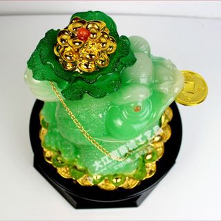 thiềm thừ cõng củ cải xanh