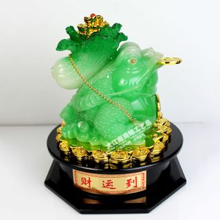 thiềm thừ cõng củ cải xanh
