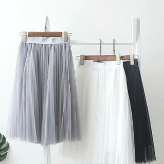 chân váy dập ly