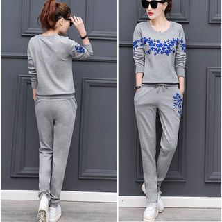 Đồ bộ thể thao nữ thêu hoa TT102