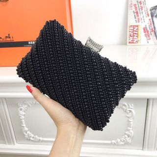 ví cầm tay kết châu