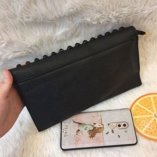 Ví cầm tay Clutch đinh valen thần thánh
