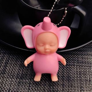 Móc khóa em bé ngủ mặc đồ bộ hình thú
